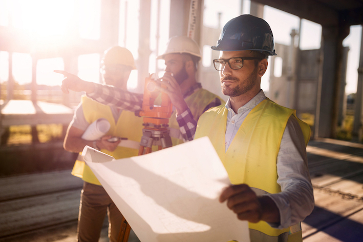 Picture of construction engineer working on building site Picture of construction engineer working on building site